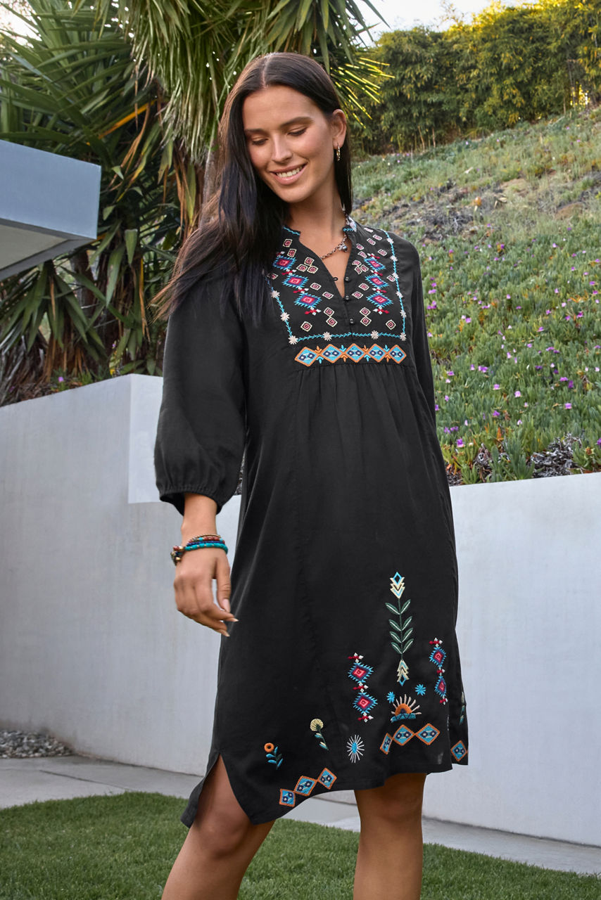 SHOP DRESSES